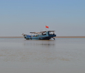 Fishing boat on the Yellow River; the boats often become scientific 